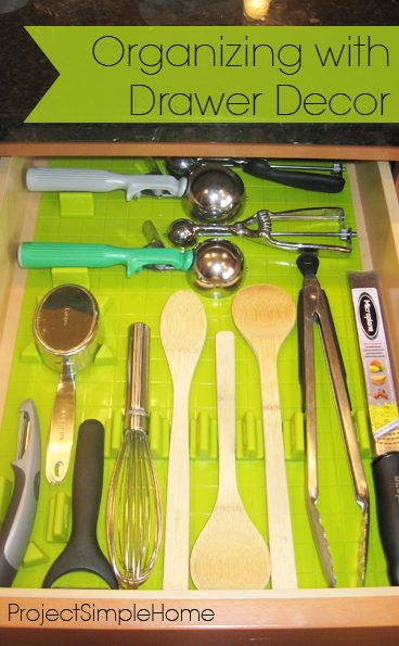 Kitchen utensils arranged on a lime green drawer liner
