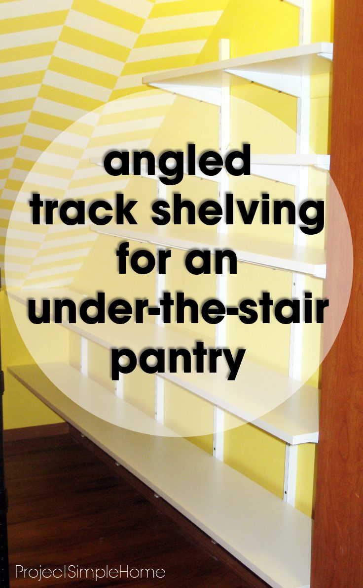 Angled white shelving installed beneath a stair